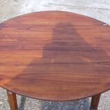 Round table in pine , with flaps