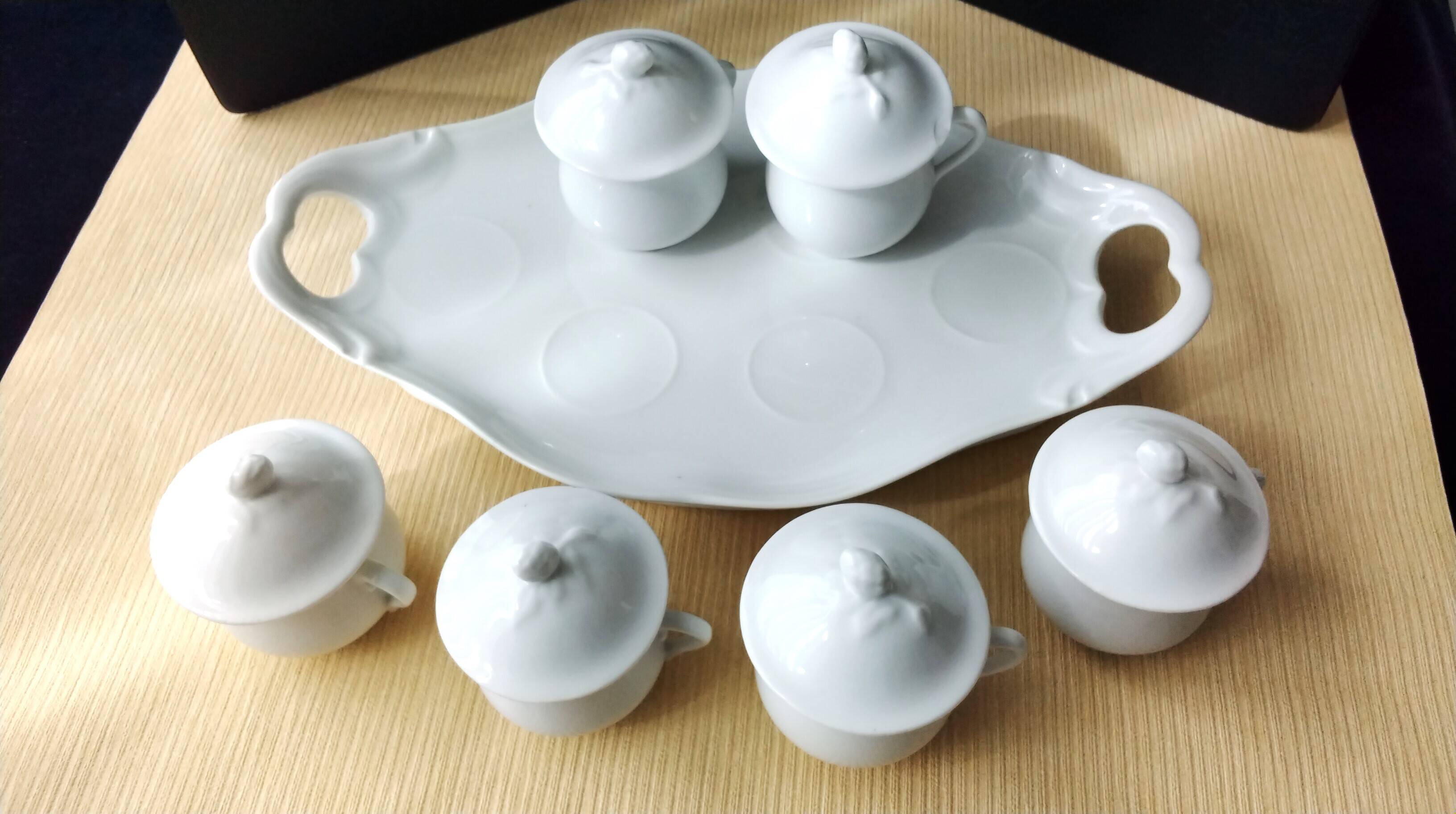 Antique white porcelain cream service
