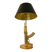 Starck gun lamp for flos