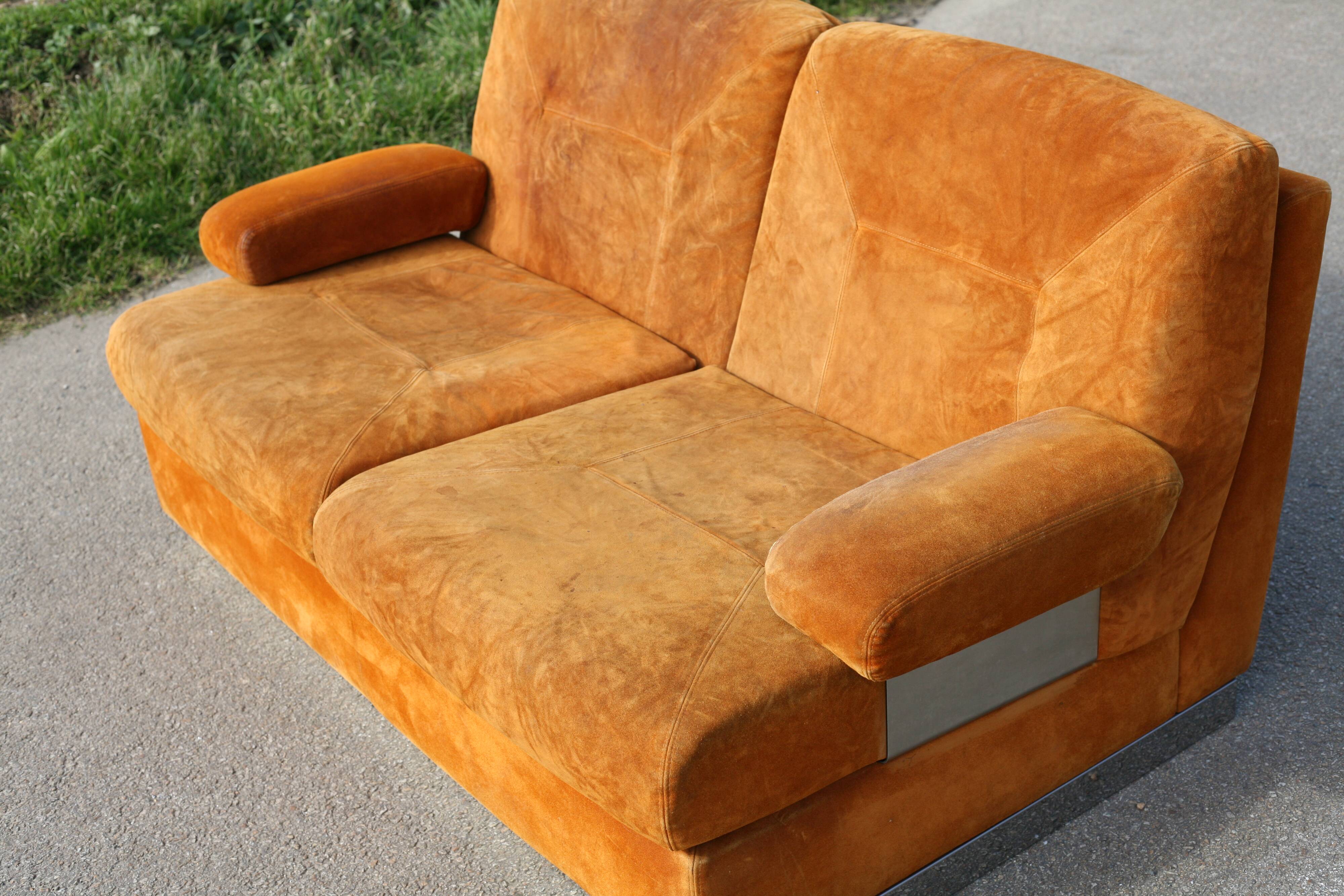 Orange suede leather and steel sofa. Circa 1970