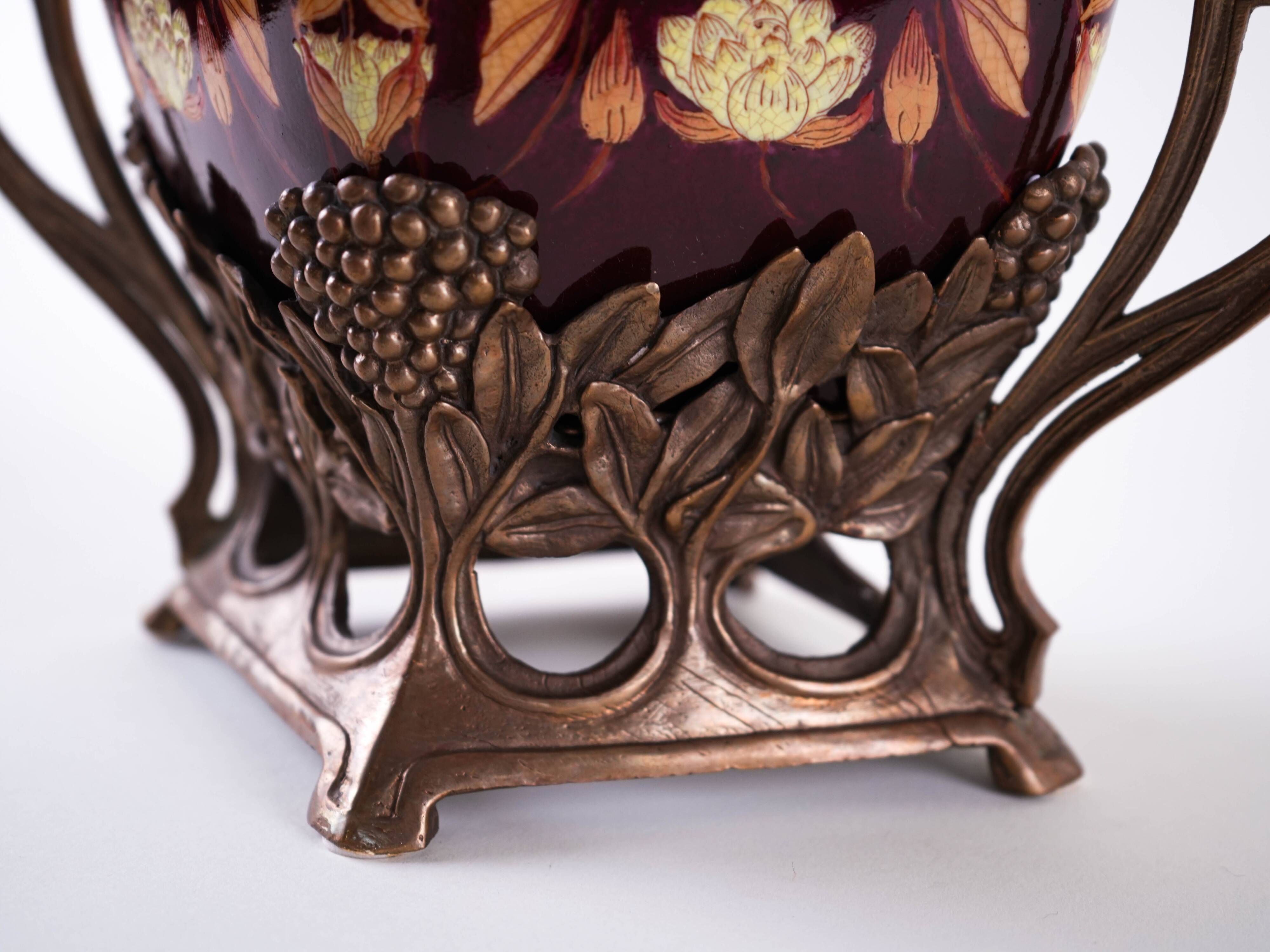 Art Nouveau ceramic platter in gilded basket with grapevine motif, Europe