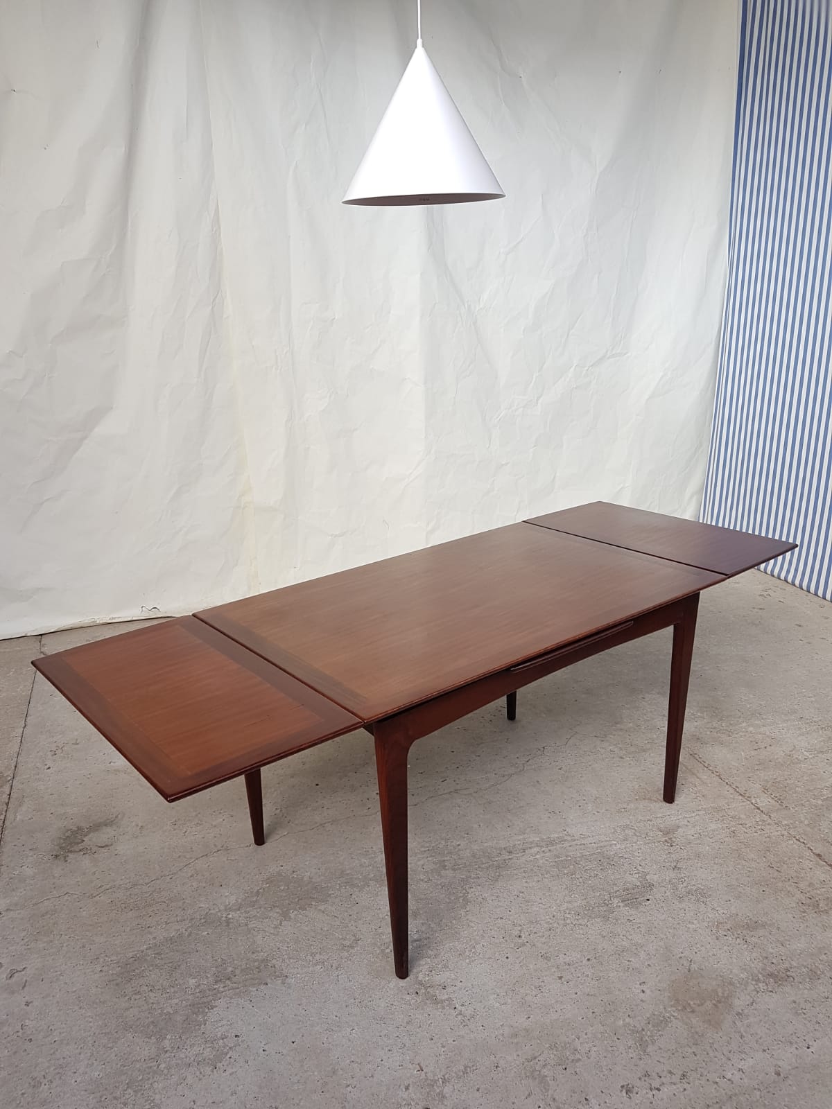 Teak extending dining table by Younger