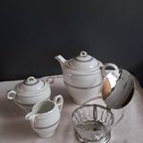 Teapot, sugar bowl, milk jug, jam jar.