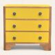 Commode art déco jaune poudré et bois brut