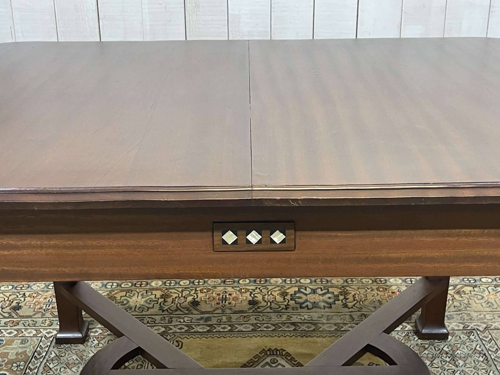 Art Nouveau dining table in mahogany in the style of Gustave Serrurier-Bovy.