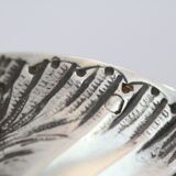 Solid silver rock style towel round