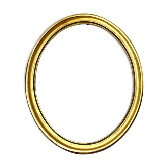 Old oval gilded wooden frame