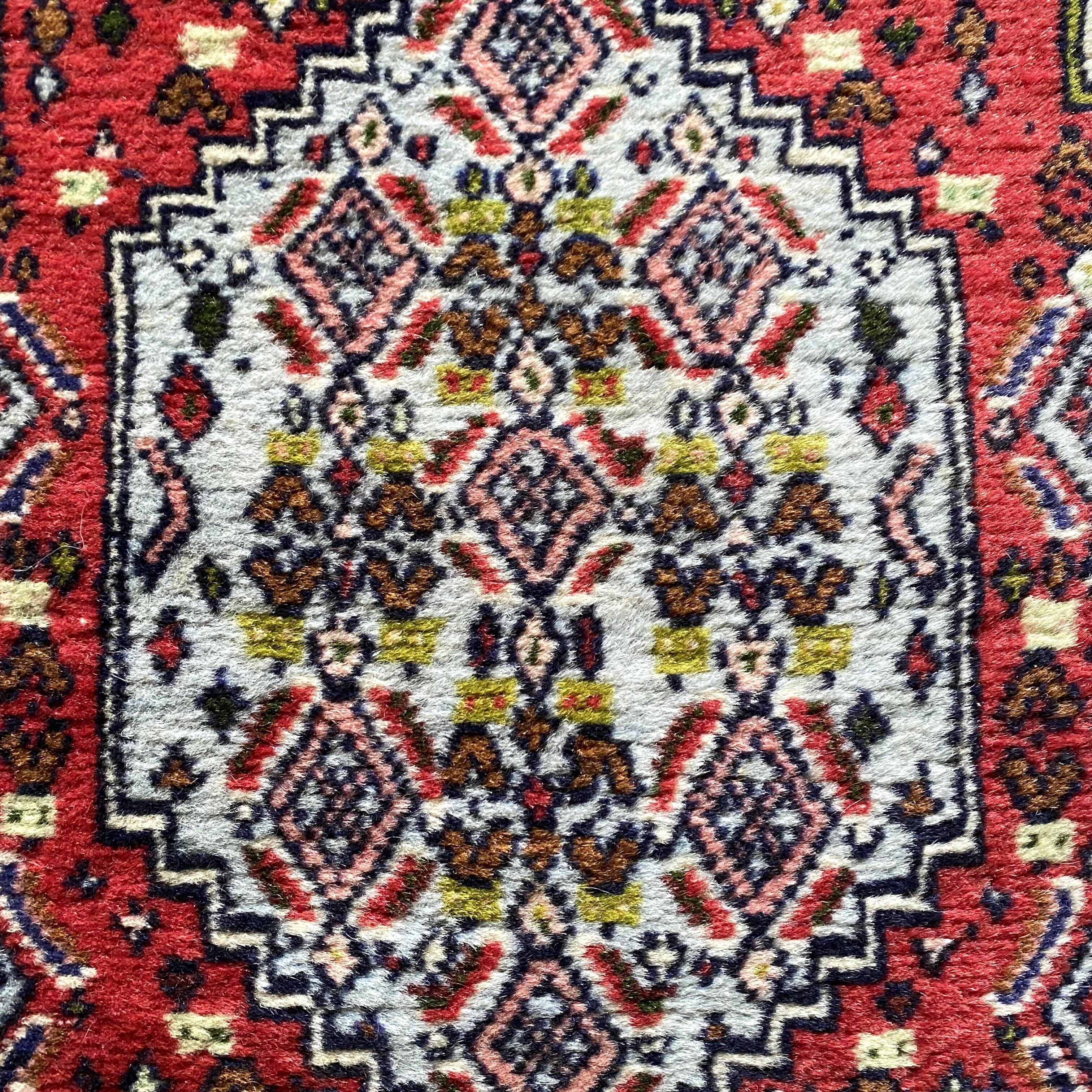 Persian wool carpet 69x113