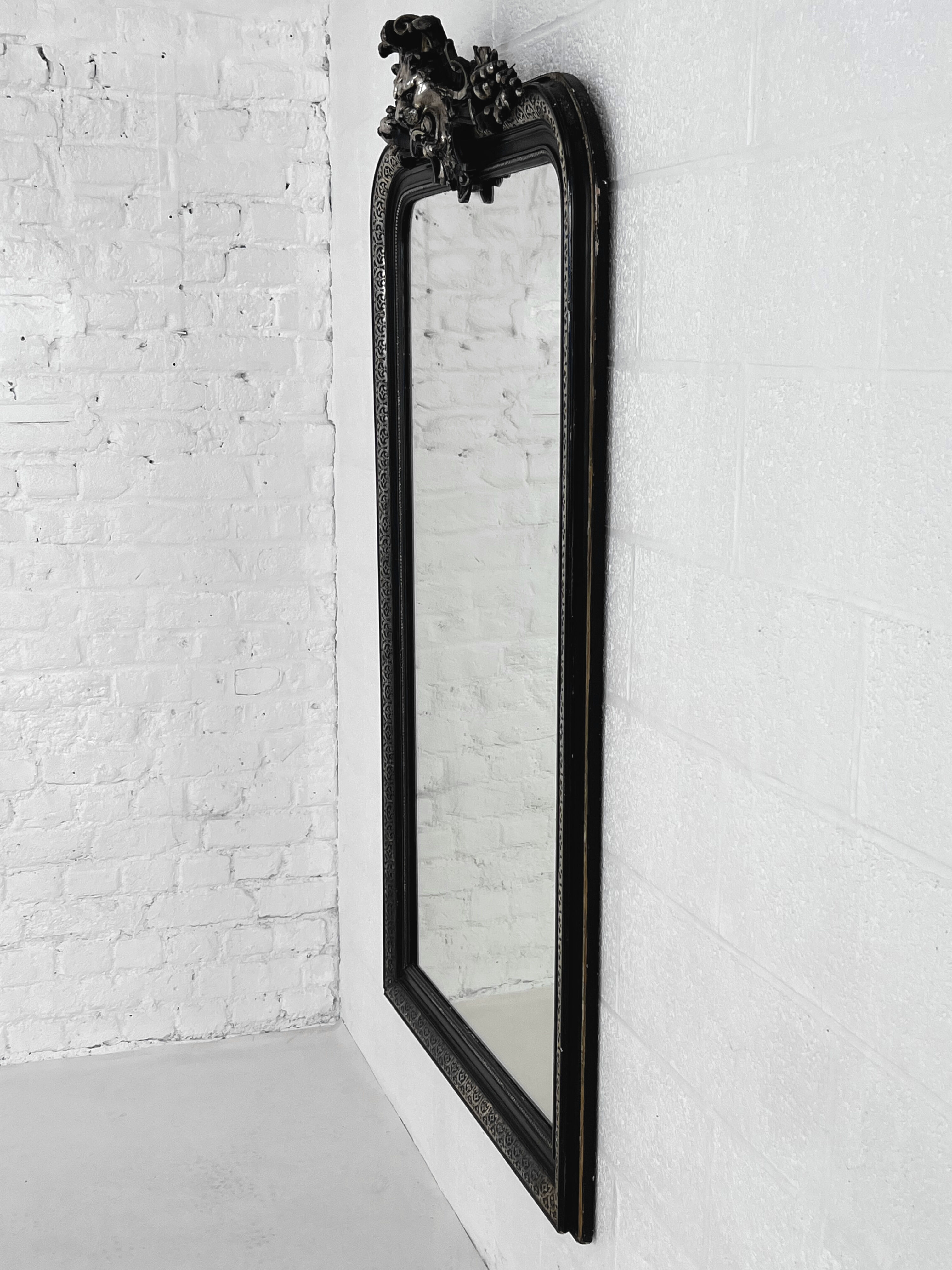 Old wooden mirror in Baroque or Napoleonic style