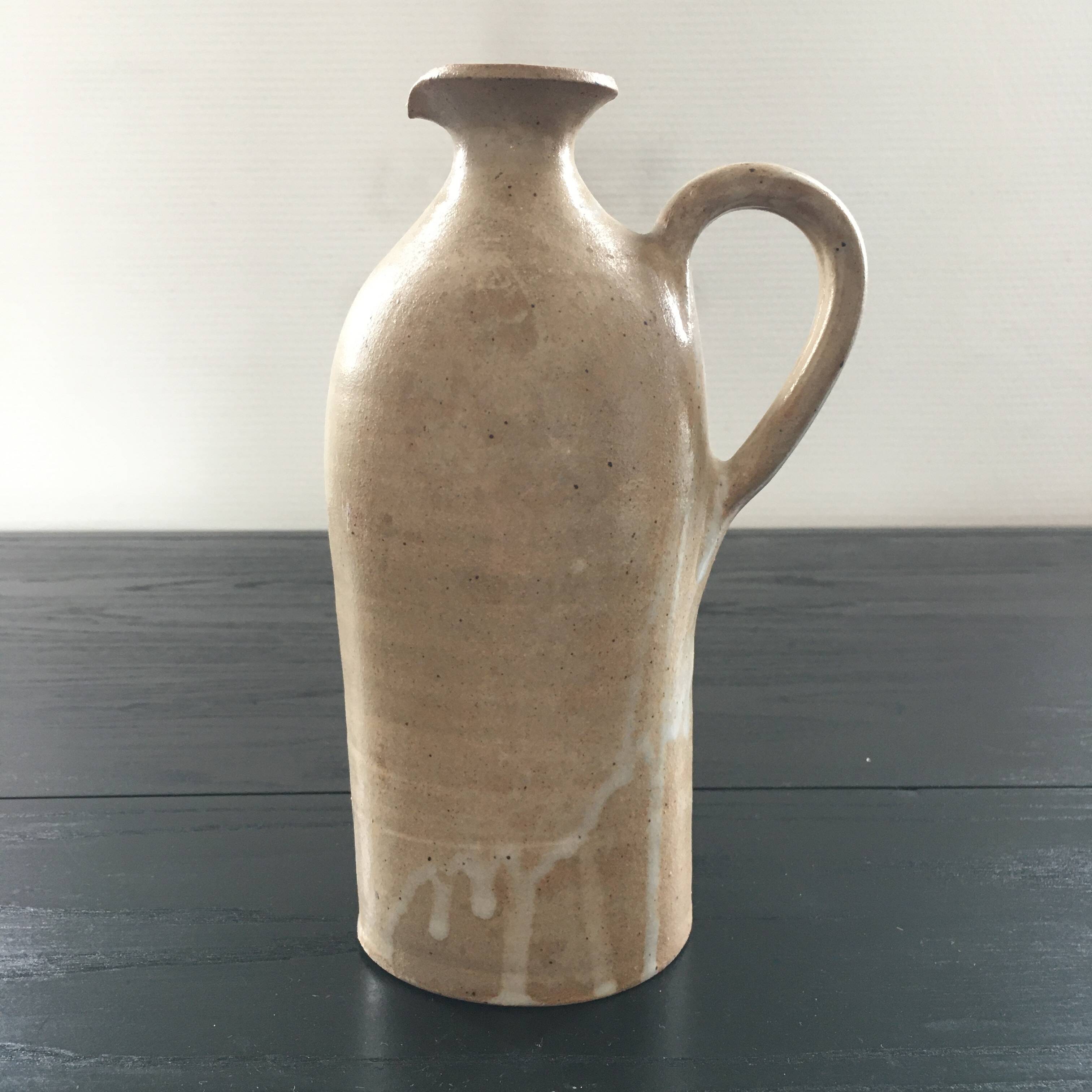 Beige stoneware bottle