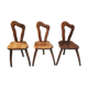 3 brutalist wooden tripod chairs