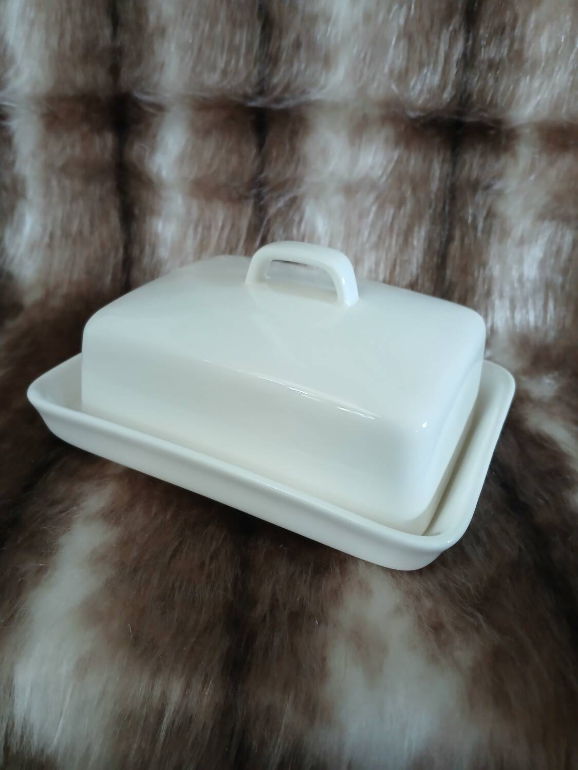White ceramic butter dish