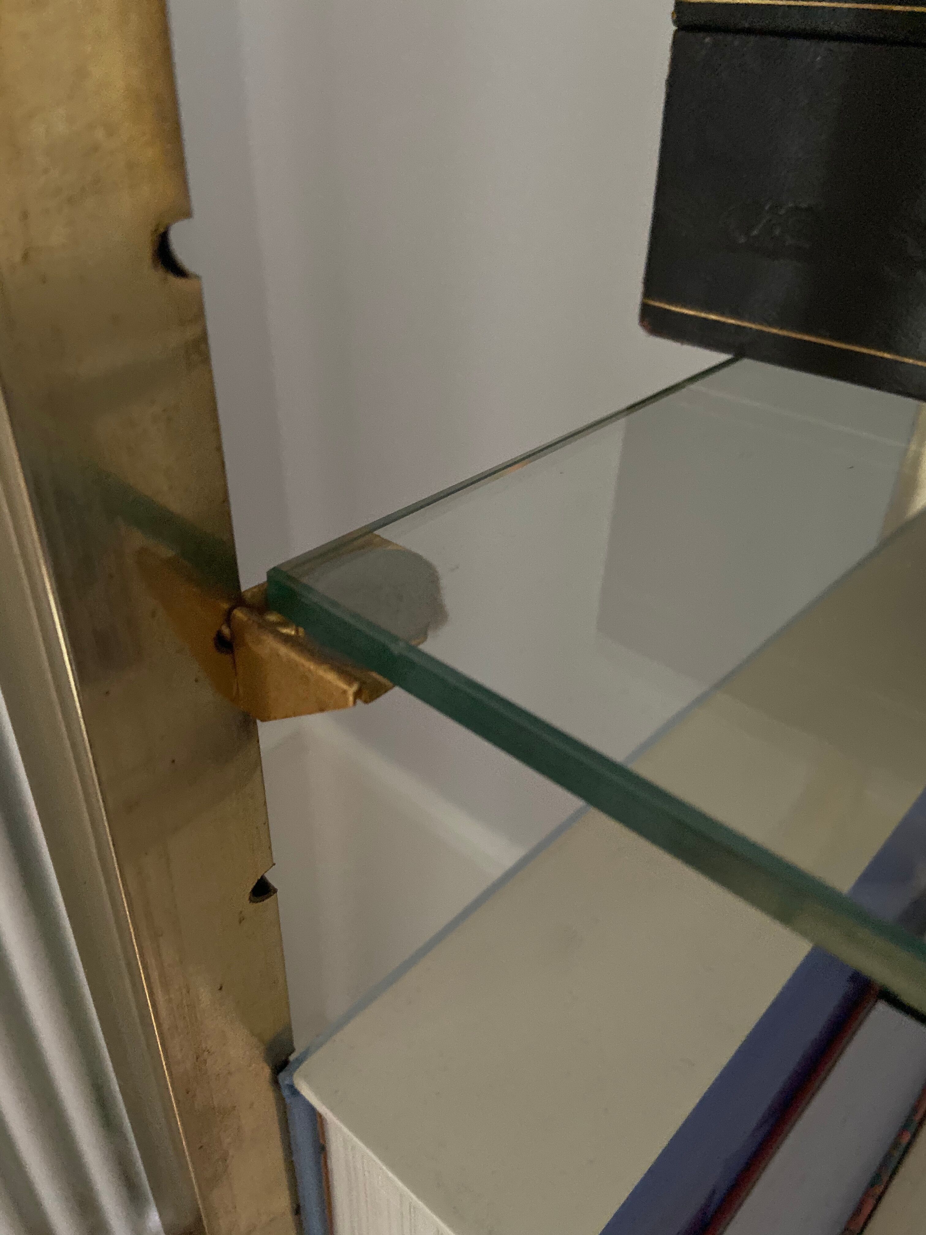 Glass and brass shelf