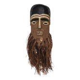 African mask painted in wood with raffia, 1980s.