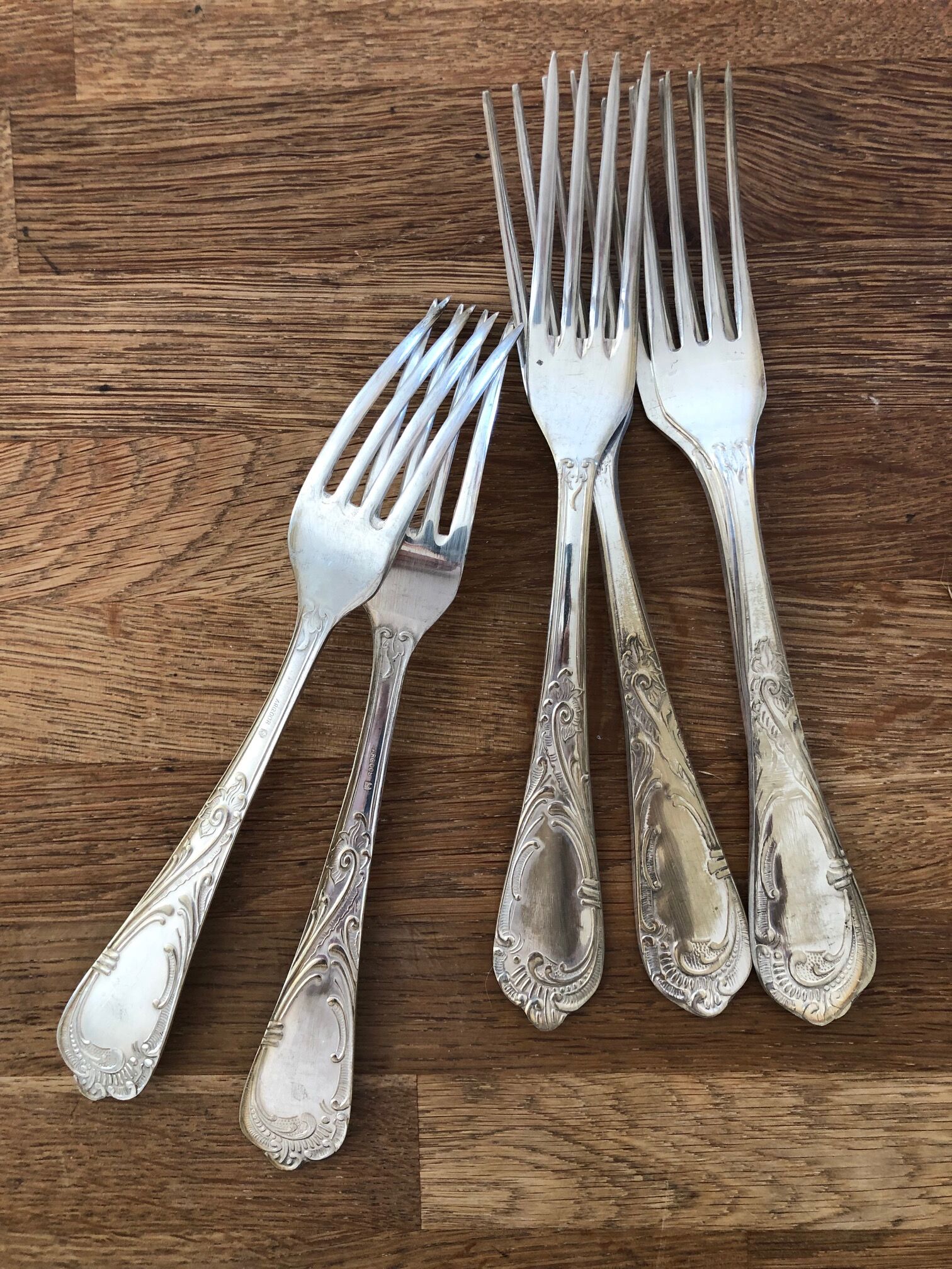 Series of 24 antique silver metal cutlery