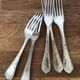 Series of 24 antique silver metal cutlery