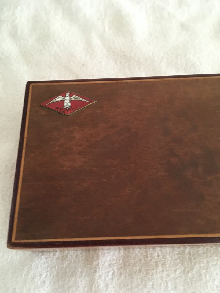 Cigar box or cigarettes in varnished wood