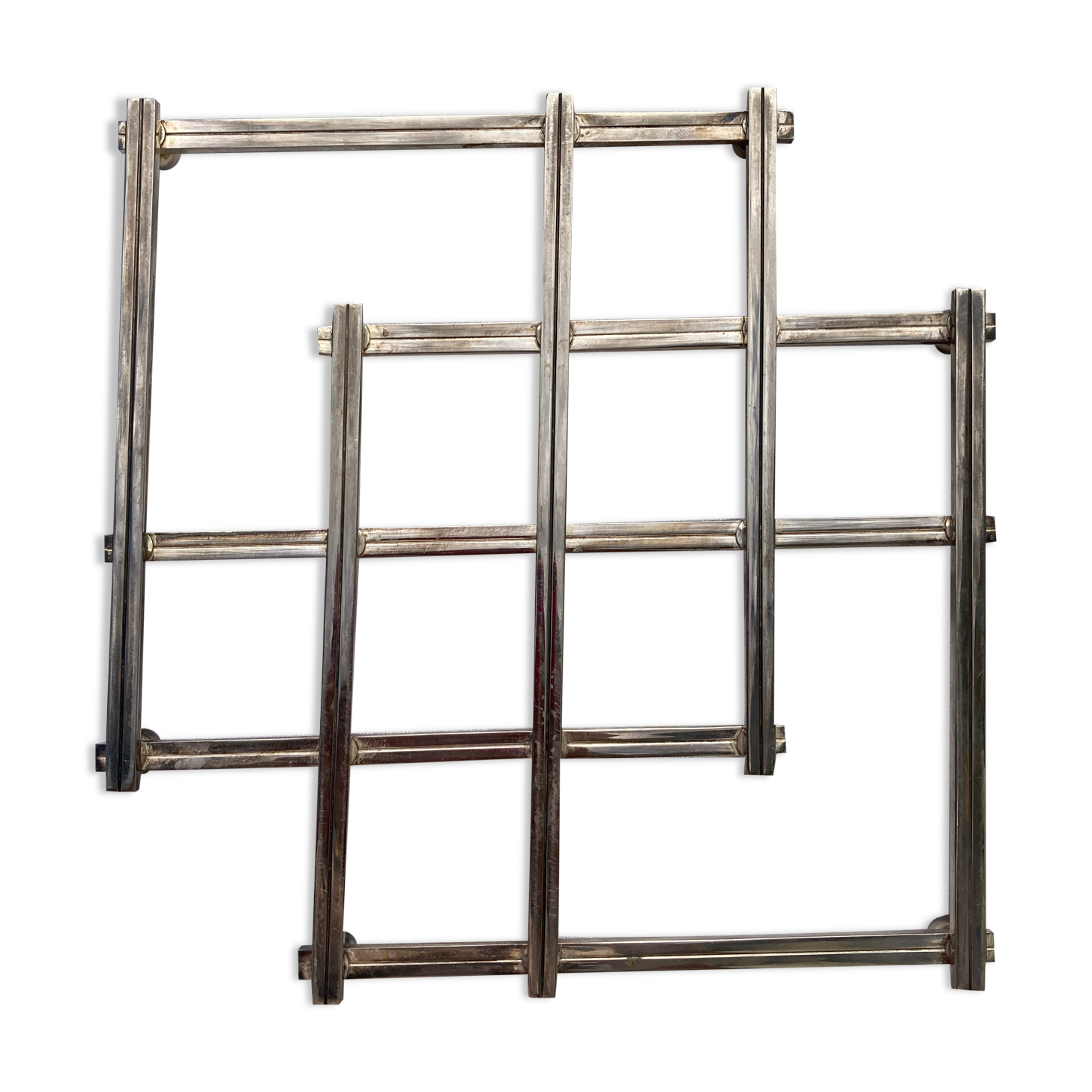 Stretch trivets in silver metal, geometric shapes