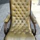 Victoria style green leather chesterfield armchair