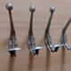 4 metal wall hooks 50s
