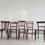 Mismatched wooden bistro chairs