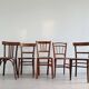 Mismatched wooden bistro chairs