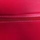 Red leather chairs by Arper