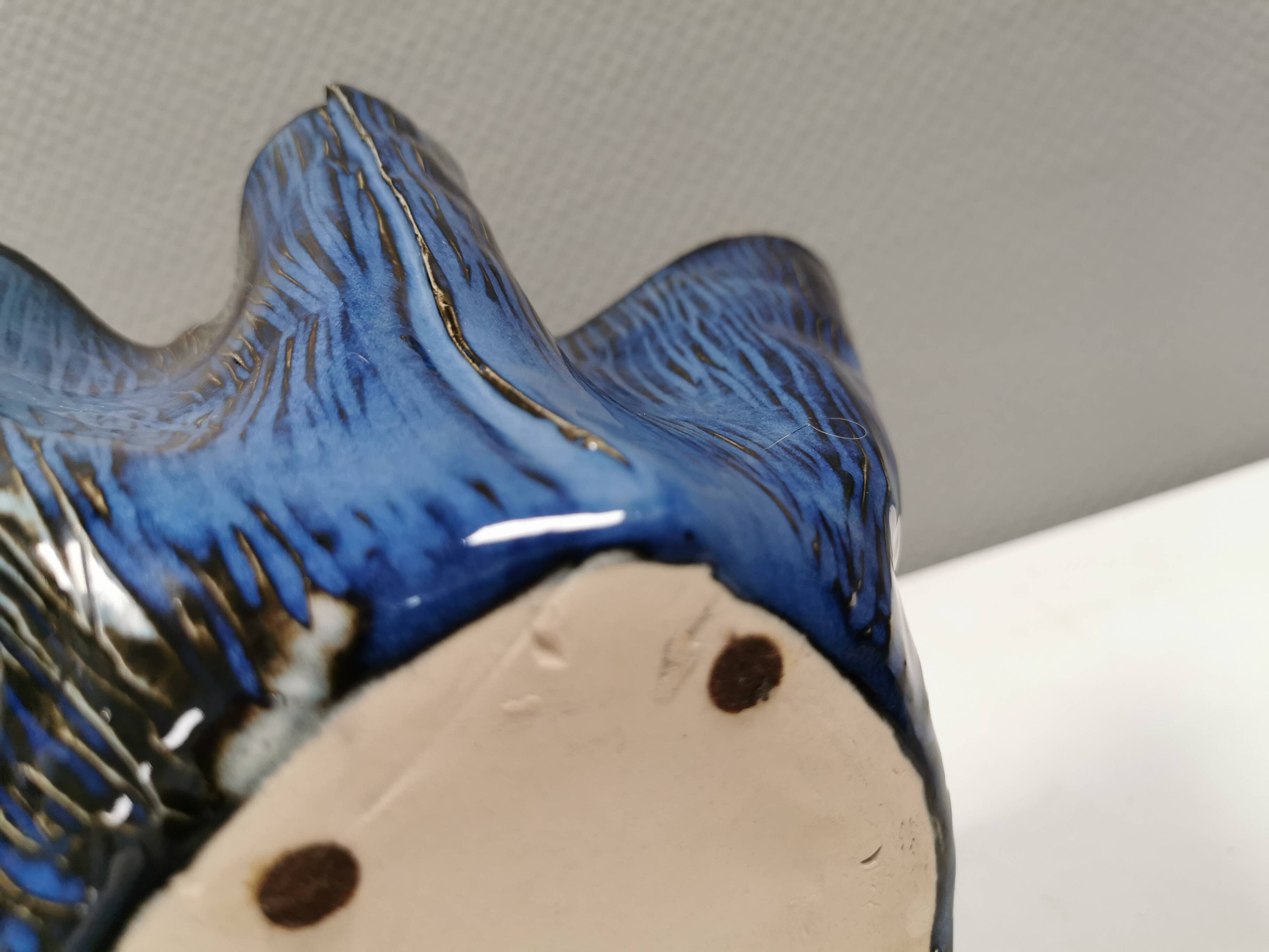 Very special vase in “folded” bluish glazed clay.