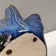 Very special vase in “folded” bluish glazed clay.