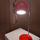 Eyeball space age orange desk or bedside lamp on an arc base