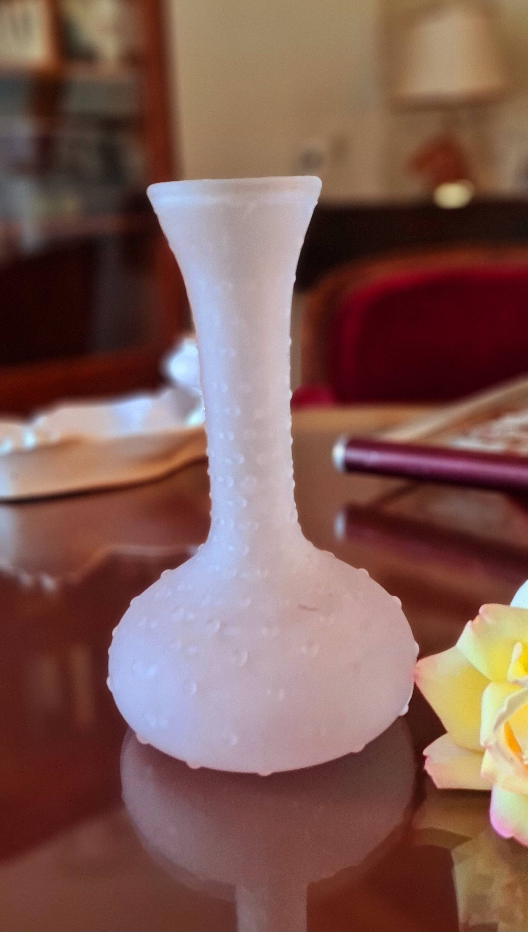 Small molded glass vase