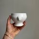 4 bols en porcelaine blanche
