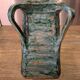 Vintage brutalist ceramic vase with 4 green handles.
