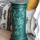 Pedestal column in green ceramic with flower and fruit decoration
