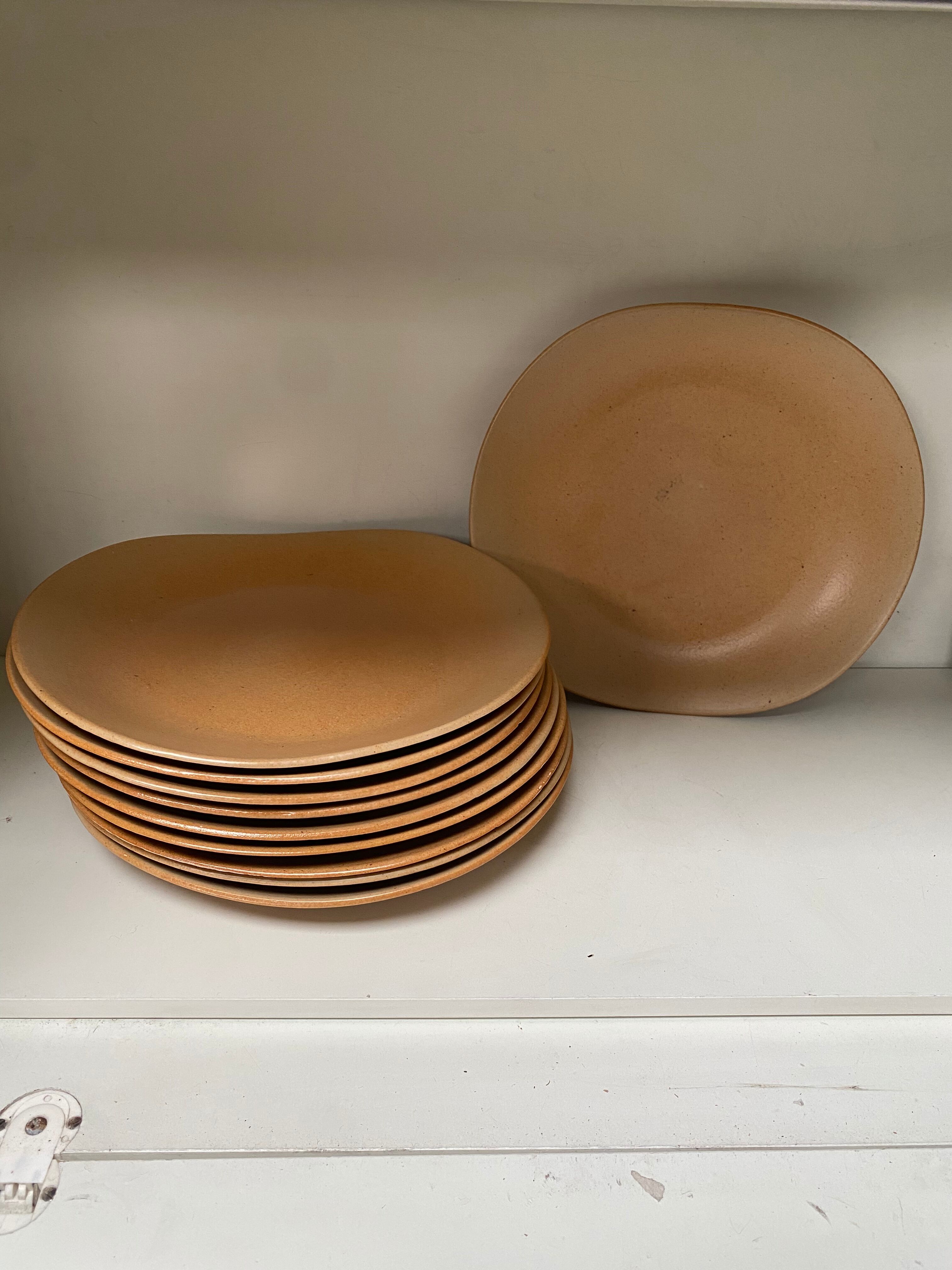 8 vintage stoneware plates
