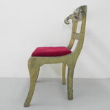 Dining chair upholstered with stamped tin