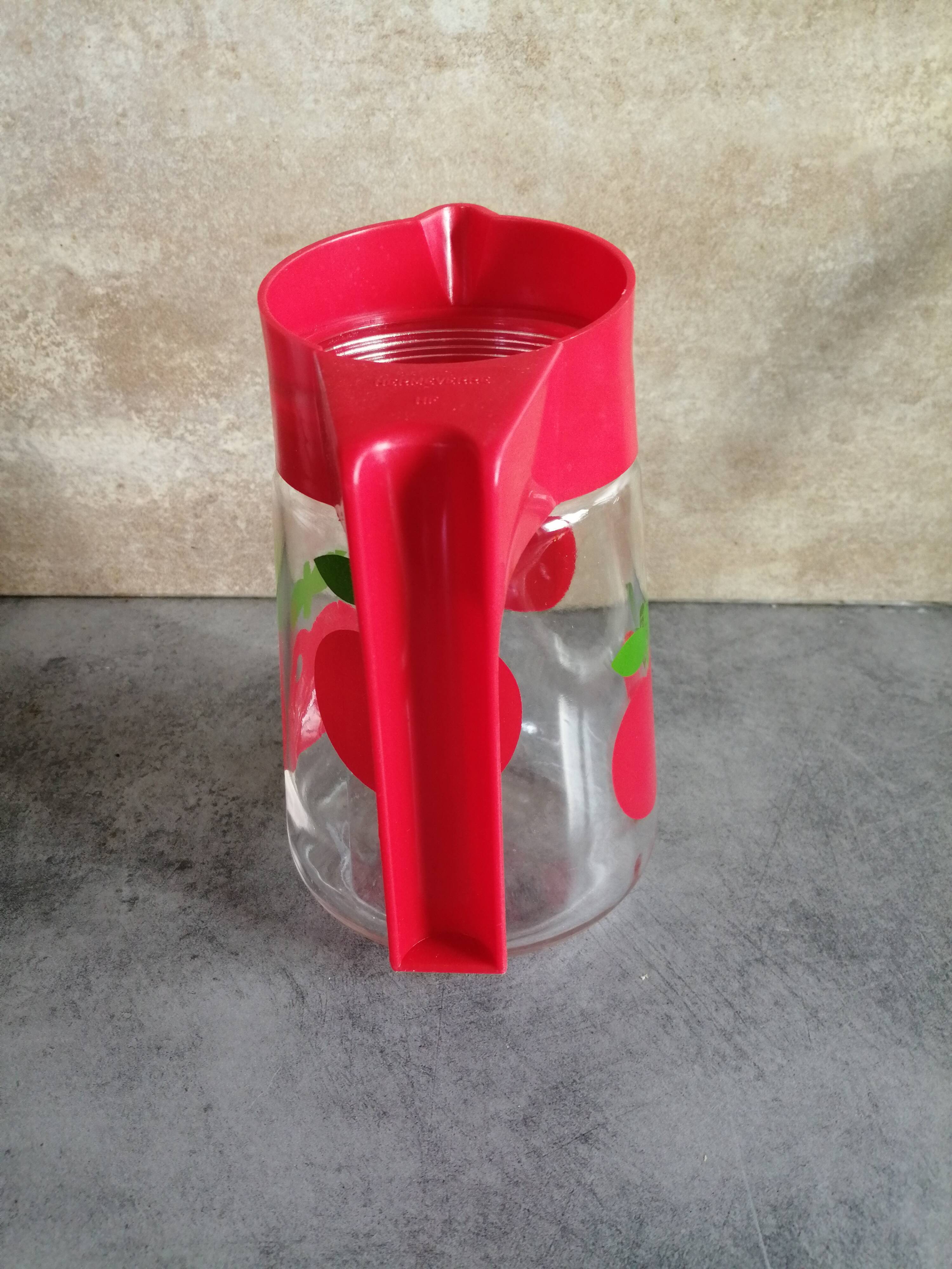 Henkel pitcher, glass with spout