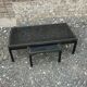 Vintage metal coffee table with glass top.