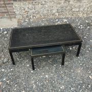 Vintage metal coffee table with glass top.