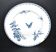 Plat rond en terre de fer Sarreguemines modèle Carmen bleu à décor de papillon, libellule