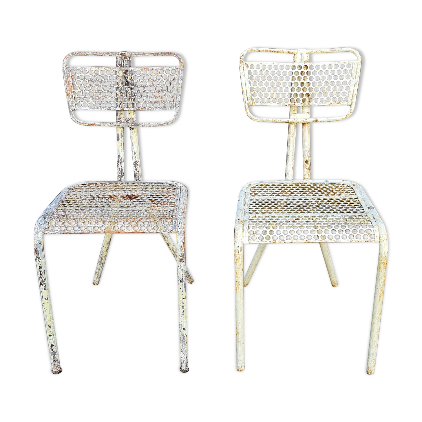 Perforated metal chairs René Malaval 1950