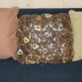 Vintage 1970s canapé with bamboo frame and Aztec patterns.