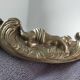 Miroir en bronze doré avec ornement anges