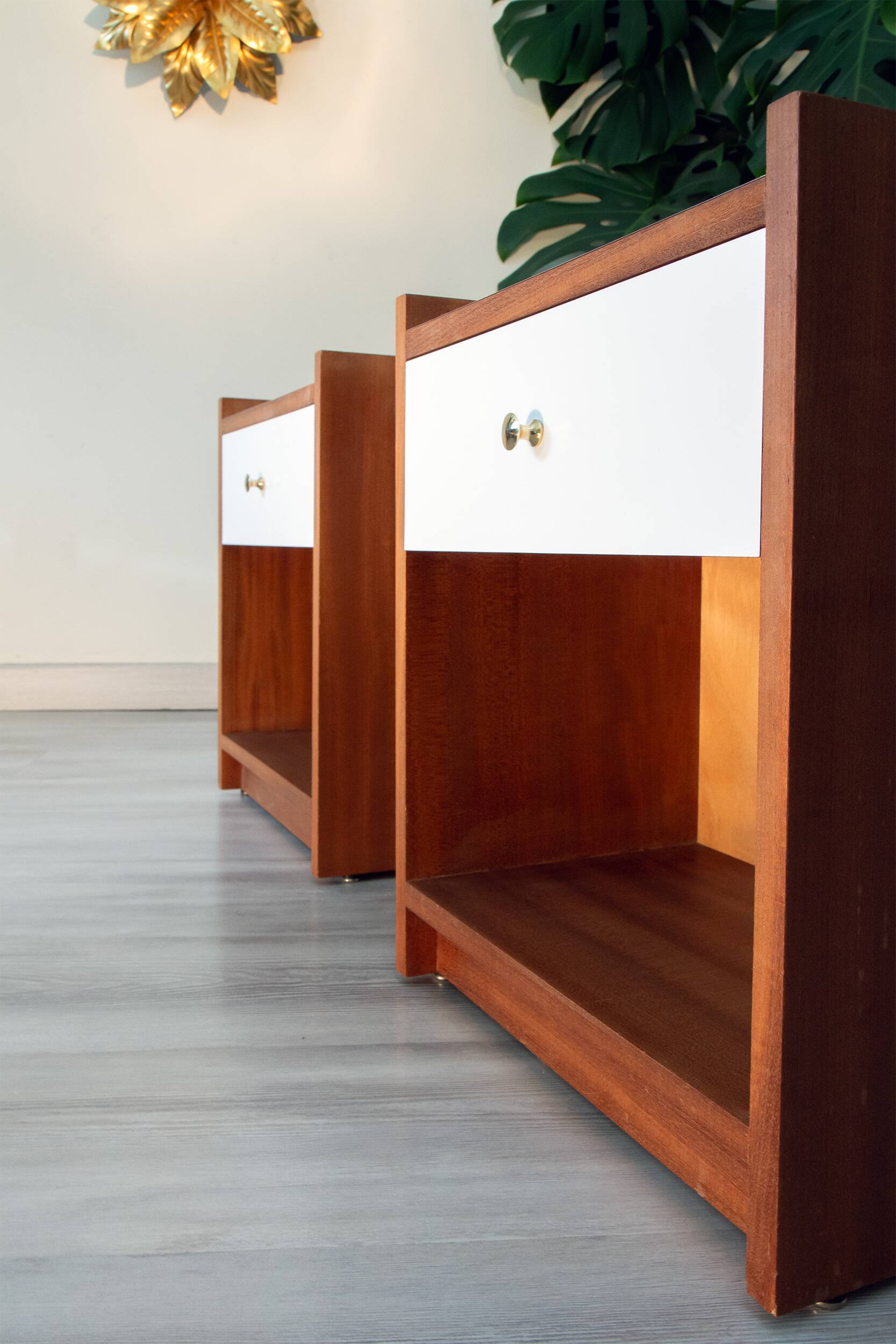 Pair of bedside tables, mahogany, white laminate and brass, 1970