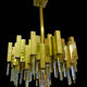Rare 1970s Lumica chandelier in brass and crystal.