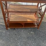 Console shelf in wood and wicker, colonial style.