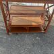 Console shelf in wood and wicker, colonial style.