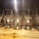 5 antique wine glasses with cut sides