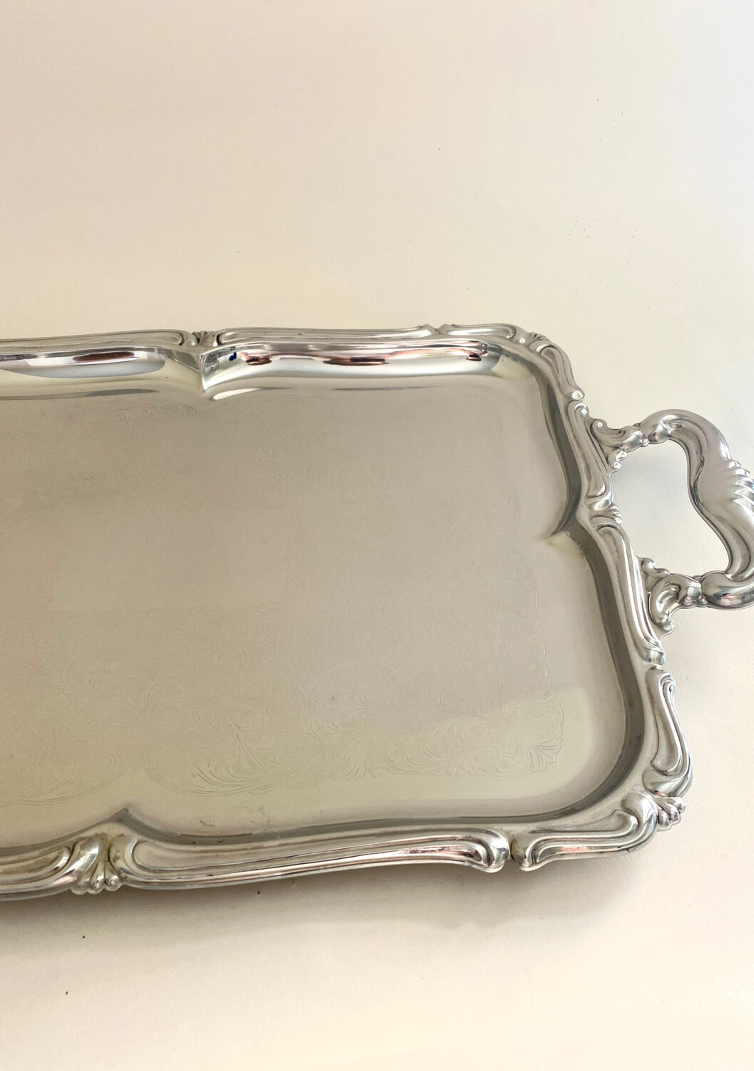 Baroque stainless steel tray Alessi