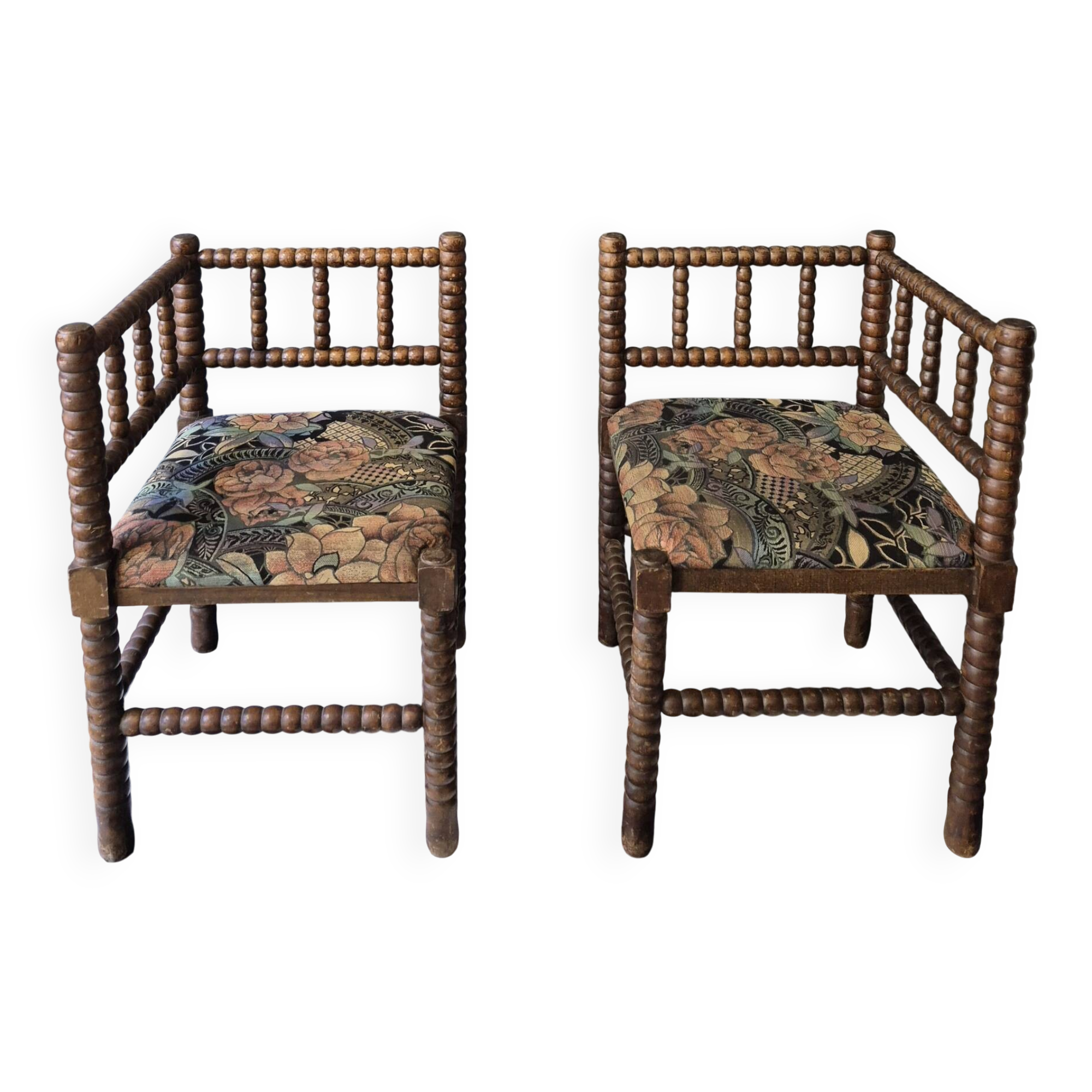 Old pair of corner chairs known as 'fireplace corner' armchairs.